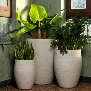 Tall GRC Planter installed beside outdoor seating area